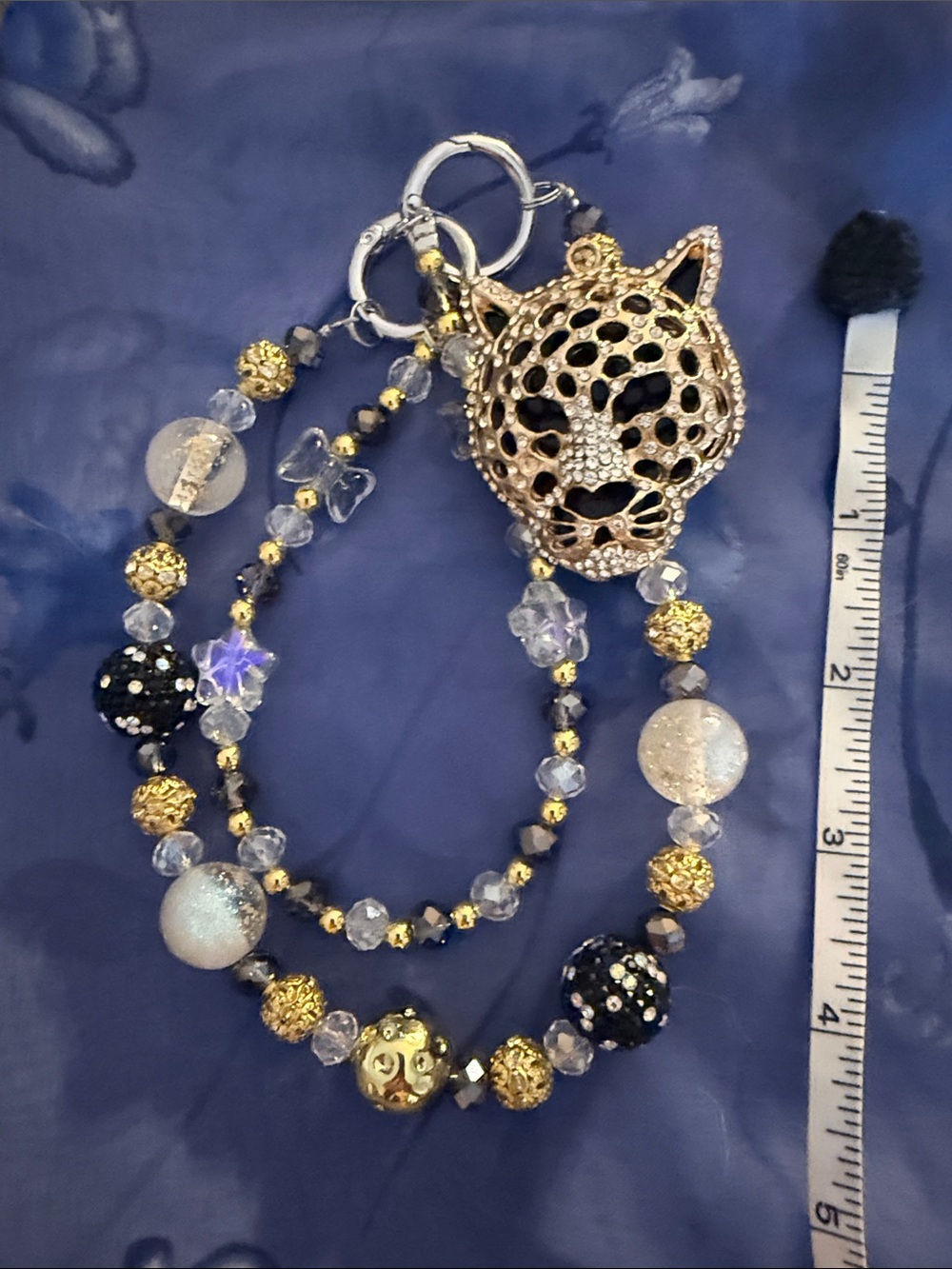 Cheetah/leopard keychain or purse accessory.